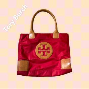 Tory Burch foldable red nylon tote with tan leather trim/handles